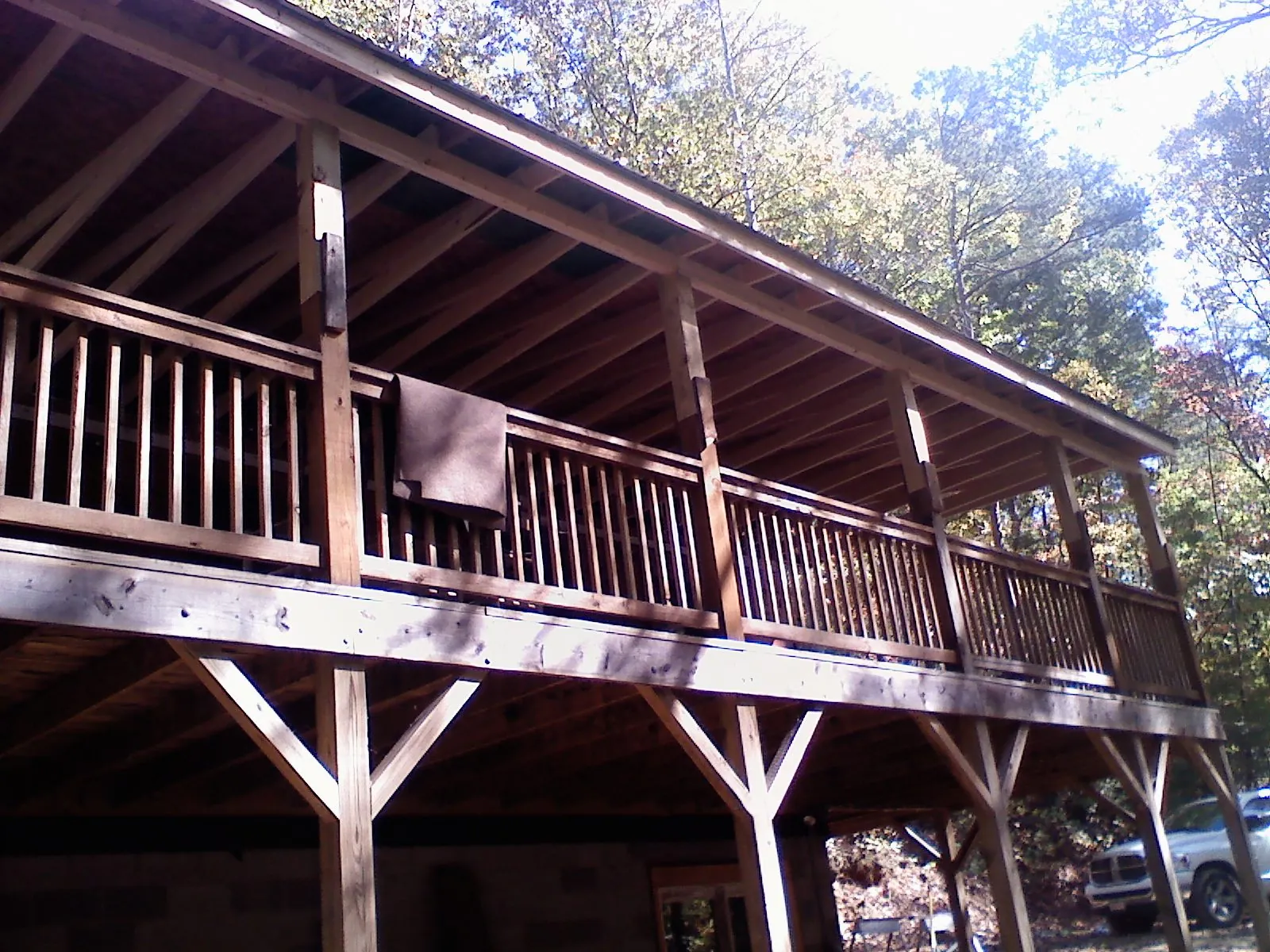 Timber framing under a new elevated porch and deck — Roof Leak Repair in Ama by Roofing Brothers